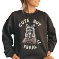 Sarcastic Raccoon Women's Oversized Sweatshirt - Cute But Feral Black Sarcastic Raccoon Women's Oversized Sweatshirt - Cute But Feral Black