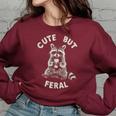 Sarcastic Raccoon Women's Oversized Sweatshirt - Cute But Feral Maroon Sarcastic Raccoon Women's Oversized Sweatshirt - Cute But Feral Maroon