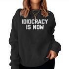 Idiocracy Is Now Saying Sarcastic Political Sweatshirt Frauen