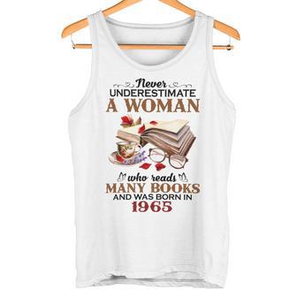 1965 A Woman Who Reads Many Books Tank Top | Mazezy
