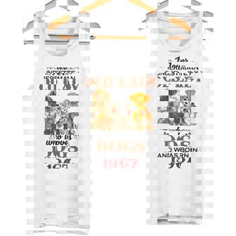 1967 An Old Lady Who Loves Dogs Tank Top | Mazezy