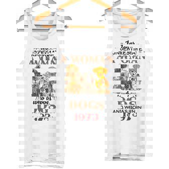 1973 A Woman Who Loves Dogs Tank Top | Mazezy