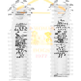 1977 A Woman Who Loves Dogs Tank Top | Mazezy