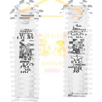 1980 An Old Lady Who Loves Dogs Tank Top | Mazezy