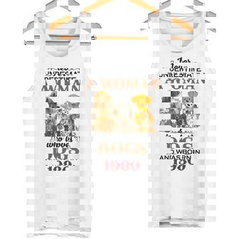 1980 A Woman Who Loves Dogs Tank Top | Mazezy