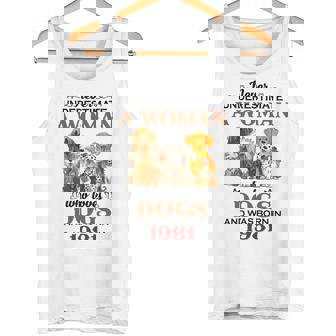 1981 A Woman Who Loves Dogs Tank Top | Mazezy