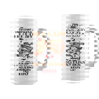1960 An Old Lady Who Reads Many Books Coffee Mug | Mazezy