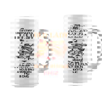 1962 An Old Lady Who Reads Many Books Coffee Mug | Mazezy