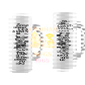 1965 A Woman Who Loves Dogs Coffee Mug | Mazezy