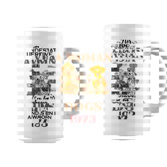 1973 A Woman Who Loves Dogs Coffee Mug | Mazezy