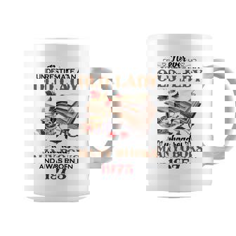 1975 An Old Lady Who Reads Many Books Coffee Mug | Mazezy