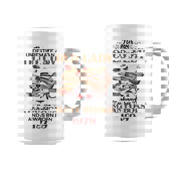 1979 An Old Lady Who Reads Many Books Coffee Mug | Mazezy