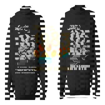 1983 Dog Paw Print Vintage Sweatshirt | Mazezy