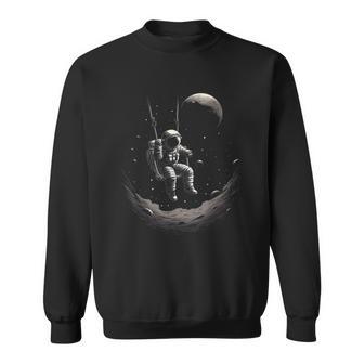 Astronaut Sitting On A Swing In Space Stars Moon Sweatshirt - Geschenkecke