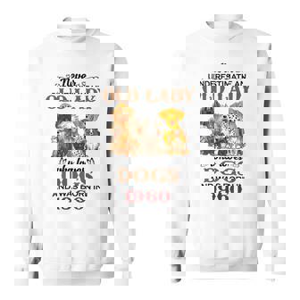 1960 X An Old Lady Who Loves Dogs Sweatshirt | Mazezy