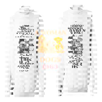 1963 A Woman Who Loves Dogs Sweatshirt | Mazezy