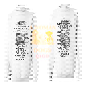 1968 A Woman Who Loves Dogs Sweatshirt | Mazezy