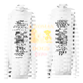 1970 A Woman Who Loves Dogs Sweatshirt | Mazezy