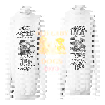 1973 An Old Lady Who Loves Dogs Sweatshirt | Mazezy