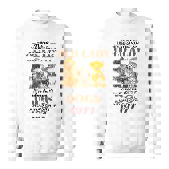 1977 An Old Lady Who Loves Dogs Sweatshirt | Mazezy