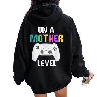 On A Mother Level Up Gamer Mom Retro Controller Women Oversized Hoodie Back Print - Thegiftio UK