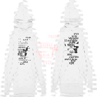 1990 A Woman Who Is Covered By The Blood Of Jesus Hoodie | Mazezy