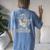 Vintage Cowboy Raccoon Women's Oversized T-Shirt | Western Humor Blue Jean