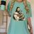 Jesus Hugging Raccoon - Vintage Women's Comfort Colors T-Shirt Chalky Mint