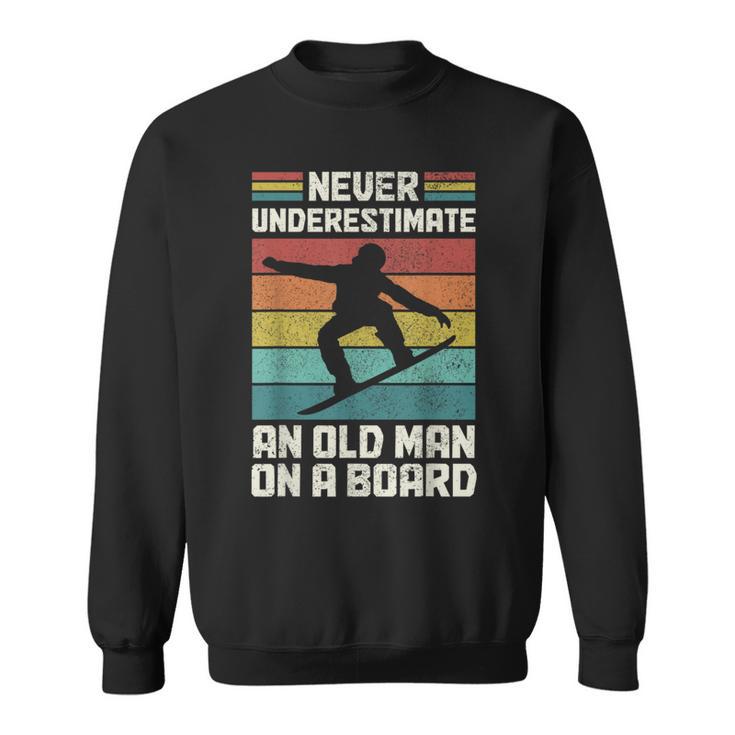 Never Underestimate An Old Man On A Snowboard intage Sweatshirt