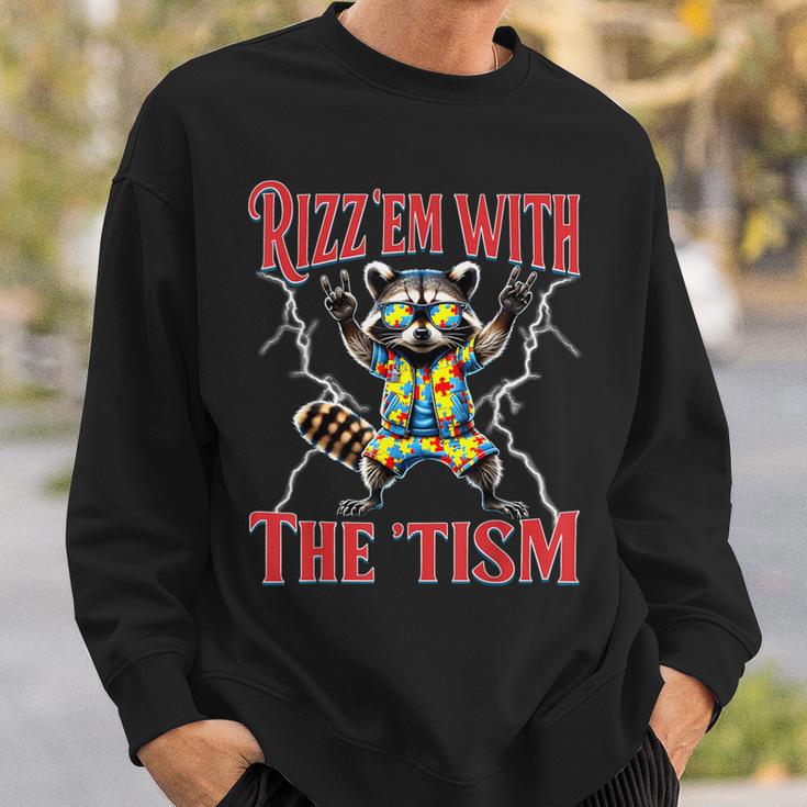 Autism Rizz Em With The Tism Meme Autistic Racoon Hand Rock Sweatshirt Gifts for Him