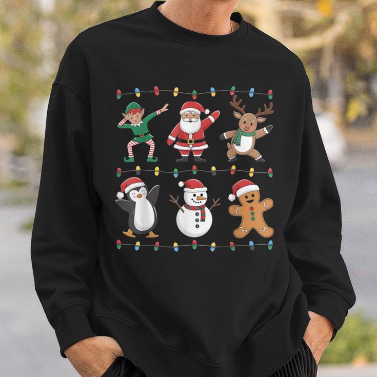 Christmas Reindeer Penguin Graphic With Santa Hat Sweatshirt Geschenke für Ihn