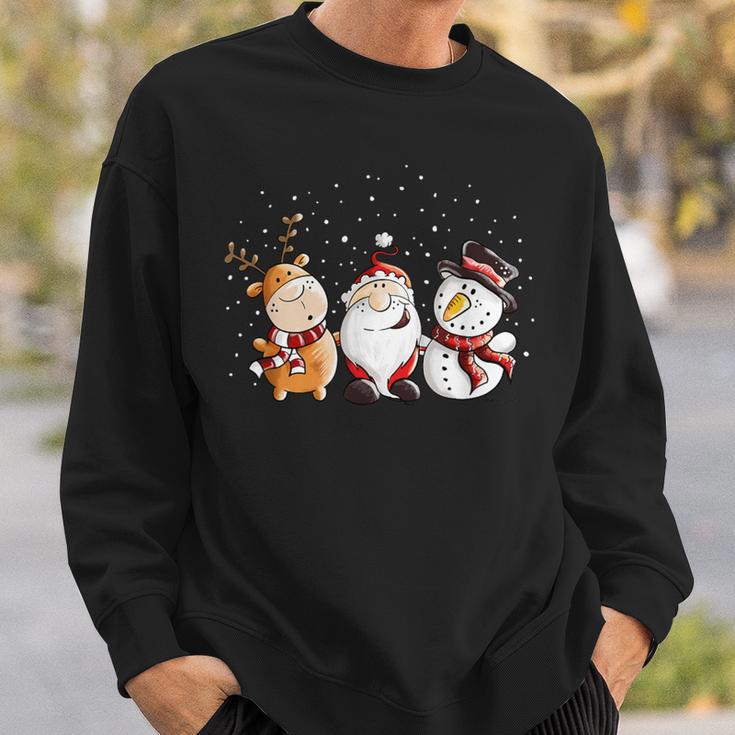 Santa Claus Reindeer And Snowman In The Snow I Christmas Sweatshirt Geschenke für Ihn