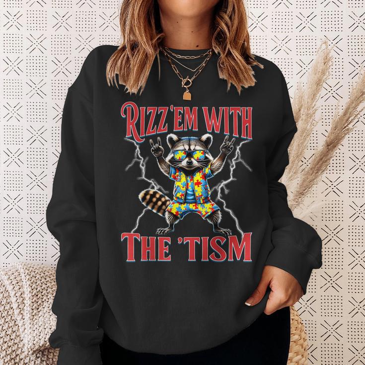 Autism Rizz Em With The Tism Meme Autistic Racoon Hand Rock Sweatshirt Gifts for Her