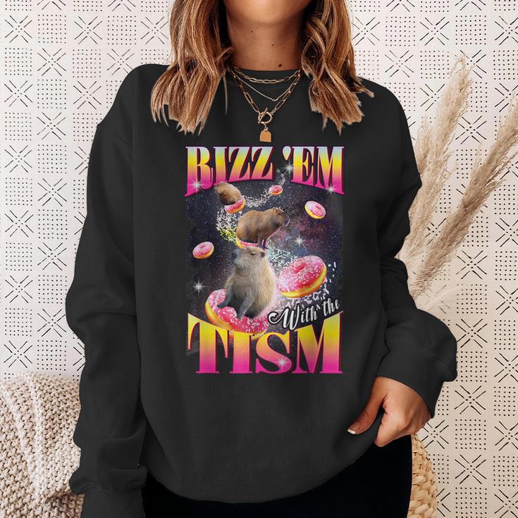 Rizz 'Em With The Tism Donut Capybara Sweatshirt Gifts for Her