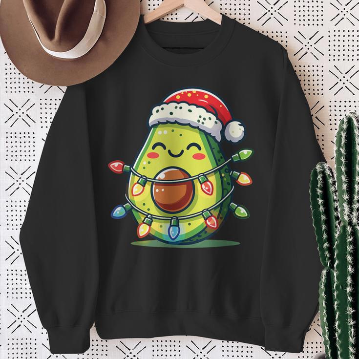 Festive Avocado Santa Christmas Lighting Sweatshirt Geschenke für alte Frauen