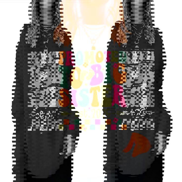 Promoted To Big Sister 2025 Soon To Be Big Sis Groovy Women Sweatshirt