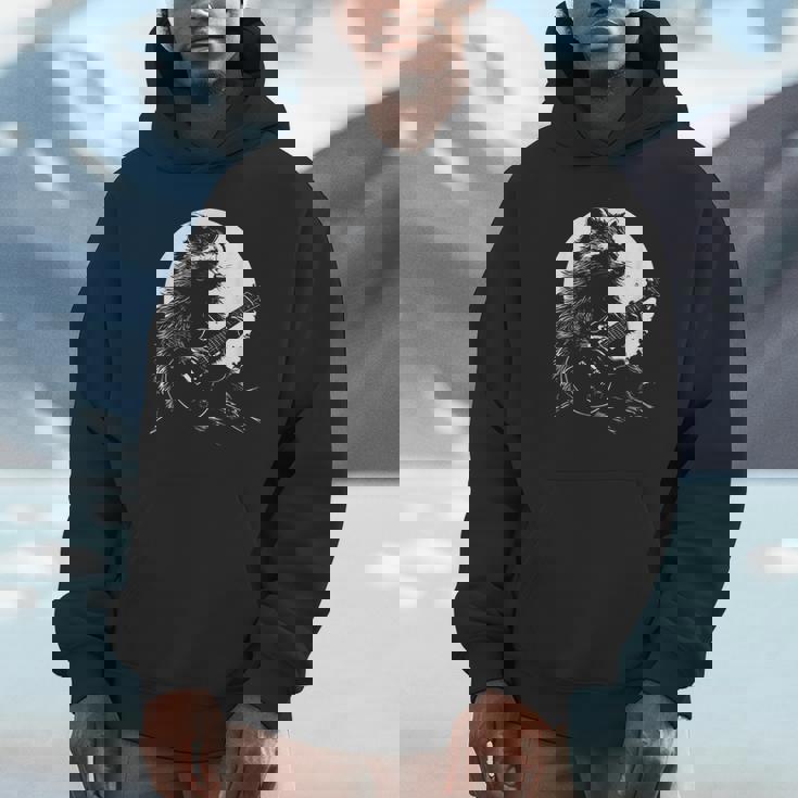 Raccoon Guitarist Unisex Hoodie | Whimsical Moonlit Design