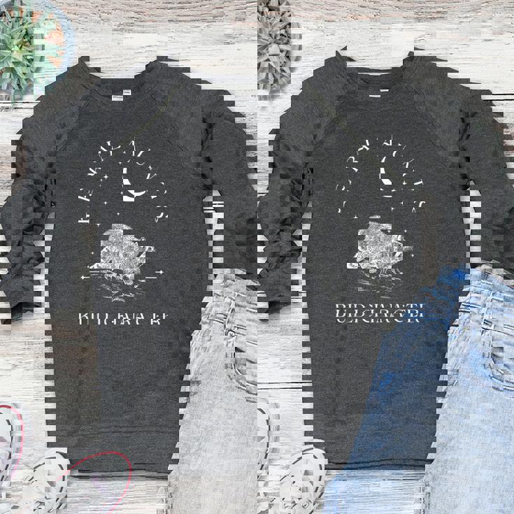 Raccoon Cowboy Graphic Elegance | Unisex Crewneck Raglan Sweatshirt