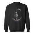 Astronaut Sitting On A Swing In Space Stars Moon Sweatshirt