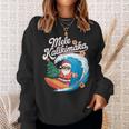 Vintage Cute Mele Kalikimaka Christmas Santa Surfing Costume Sweatshirt Geschenke für Sie