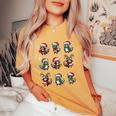 Raccoon Pajama Women's T-Shirt - Cozy Christmas Lights Theme Mustard