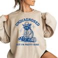 Cowboy Raccoon Meme Women's Oversized Sweatshirt | Fun & Cozy Vibe Sand