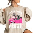 Get In Loser We’Re Going Feral Raccoon Opossum Meme Women's Oversized Sweatshirt Sand