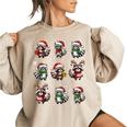 Raccoon Pajama Women's Oversized Sweatshirt - Cozy Christmas Lights Decor Sand
