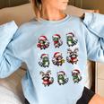 Raccoon Pajama Women's Oversized Sweatshirt - Cozy Christmas Lights Decor Light Blue