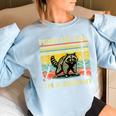Retro First Of All I'm A Delight Angry Raccoon Animal Women's Oversized Sweatshirt Light Blue