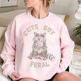 Cute But Feral Sarcastic Raccoon Small Women's Oversized Sweatshirt Light Pink