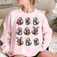 Raccoon Pajama Women's Oversized Sweatshirt - Cozy Christmas Lights Decor Light Pink