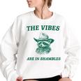 The Vibes Are In Shambles Sarcastic Raccoon Cowboy Women's Oversized Sweatshirt White