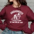 Cowboy Raccoon Women's Oversized Sweatshirt - Quirky Comfort Maroon
